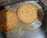 A picture of step 3 of Marie biscuits delight.