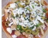 A picture of step 4 of Pizza paratha.