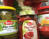 A picture of step 1 of Yaprak Sarma (stuffed grape leaves).