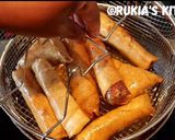 A picture of step 7 of Chicken springrolls.