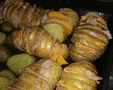 Foto del paso 3 de la receta: Papa rellenas con niño envuelto y salsa blanca