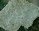 Foto del paso 5 de la receta: Aletas de calamar fritas