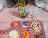 Foto langkah ke 1 dari resep Bubur Ikan Salmon (MPASI Hari Ketiga Bayi 6 bln +).