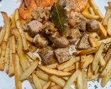 Foto del paso 6 de la receta: Bonito encebollado con langostinos y patatas