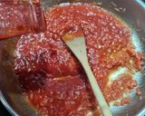 Une image de l'étape 1 de Calamars en sauce tomate.