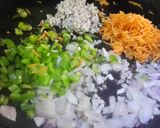 A picture of step 1 of Rava Masala Paniyaram.