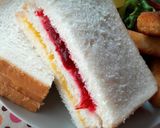 A picture of step 1 of Healthy Breakfast ~ Homemade Two-Color Jam Sandwich + Fruit and Lettuce Salad + Crispy Cod Sticks + Cranberry Sparkling Water.