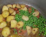A picture of step 3 of Aloo and Matar pulao.