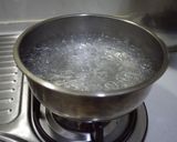A picture of step 1 of Garlic Sautéed Spaghetti.