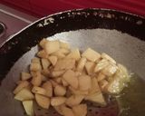 A picture of step 4 of Tindora (little gourd) with potato and tomato.