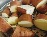 A picture of step 2 of Steam Sweet Potatoes 🍠🍠.