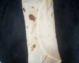 A picture of step 3 of Spicy omelette stuffed 'roti'.