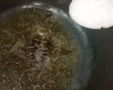 A picture of step 2 of Chicken flavored simple rice.