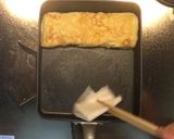 A picture of step 7 of Dashimaki Tamago (Japanese rolled omelete).