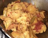 A picture of step 3 of Gobhi sabzi with rice.