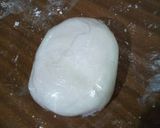 A picture of step 6 of Chocolate with ground nuts cake covered in fondant.