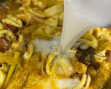 Gambar langkah 3 resipi Sotong, Pucuk Paku & Tempe Masak Lemak Kuning.