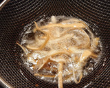 A picture of step 3 of Deep Fried Parsnip Peels.