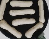 Foto del paso 3 de la receta: Pan casero relleno de salchicha y salsa criolla