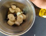 A picture of step 1 of Banana suji cake (eggless, on stove).