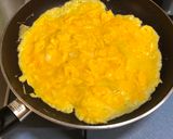A picture of step 5 of Japanese Egg Wrapped Tomato Chicken Rice (Omu Rice).