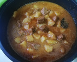 Foto del paso 8 de la receta: Patatas con carne en salsa con picada de frutos secos