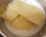 A picture of step 2 of Hashbrowns and two Cheese and onion dip.
