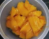 A picture of step 2 of Mango milkshake.