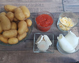 Foto del paso 1 de la receta: Patatas guarnición con tomate y queso en freidora de aire