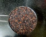 A picture of step 1 of Manipuri Chak hao tal / black rice poori.