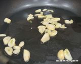 A picture of step 4 of Stir-Fried Spinach and Enoki Mushrooms with Shacha Sauce.