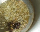 A picture of step 5 of Chicken yakhni pulao.