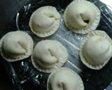 Foto del paso 5 de la receta: Sorrentinos con tapa de empanadas
