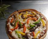 A picture of step 6 of Thin Crust Pizza.