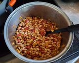 A picture of step 7 of Apple Pie Baked Beans.
