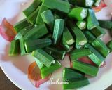 A picture of step 1 of Bhindi and Shallots Masala.
