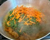 A picture of step 3 of Chicken & Shrimp Miki Bihon Guisado.