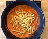 A picture of step 6 of Sausage pasta bake in tomato cream sauce.