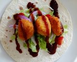 A picture of step 3 of How to please the kiddies BBQ and chicken nugget wraps.