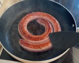 Foto del paso 2 de la receta Arroz con butifarra y puntas de jamón