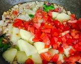 A picture of step 3 of Batata Kanda Poha.