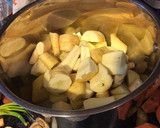 A picture of step 1 of Spicy Apple and parsnip soup.