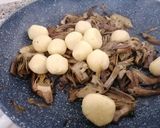 A picture of step 11 of Ricotta and Walnut Stuffed Gnocchi with Artichokes.