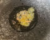 A picture of step 2 of Double Tadka Lasooni Palak Yellow Moongdal - Dhaba-Style.