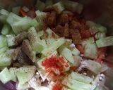 A picture of step 2 of Kachumbar nuts salad with croutons.