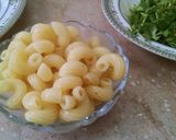 A picture of step 1 of Chicken veg macroni roll.