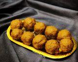 A picture of step 4 of Green moong- jaggery ladoos (saboot moong- gur ke laddoo).