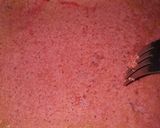 A picture of step 7 of Strawberry milk cake with whipped cream frosting.