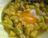 Foto langkah ke 3 dari resep Kentang telur orak-arik kuah santan.