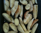 Foto del paso 3 de la receta: Papas en gajos al horno